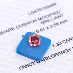Lab-grown diamond rough: cushion-cut fancy-colored diamond; 1.33-carat square-cut pink lab-grown diamond with IGI certificate